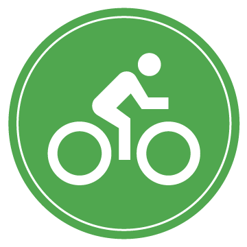 Green Circle Icon with a illustration of a person riding a bike in center. 