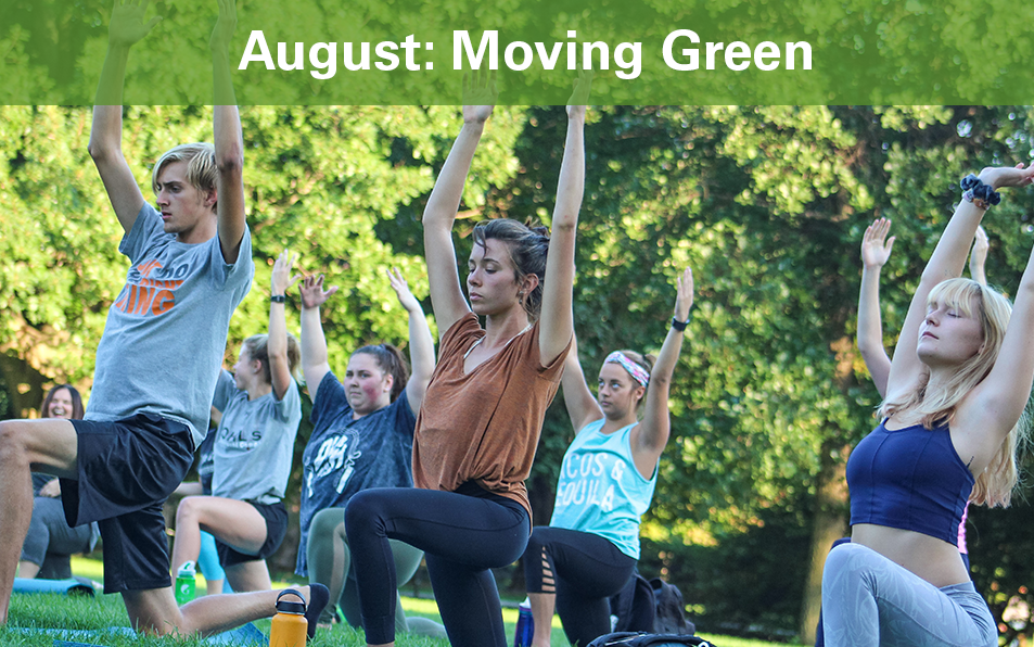 Students in yoga pose during Moving Green Event.