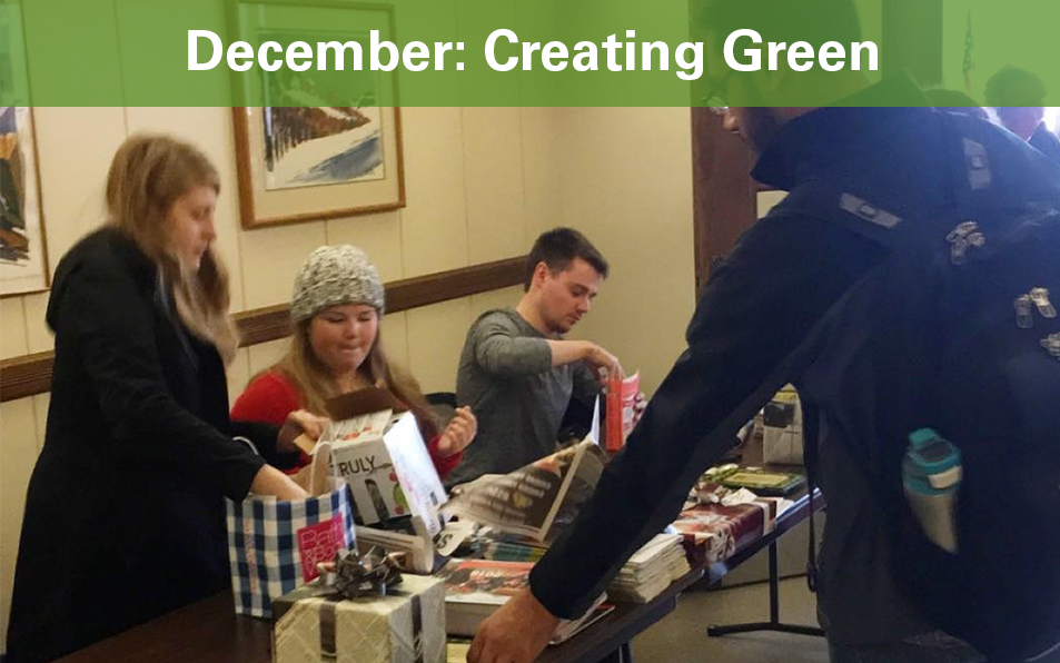 Students wrapping holiday gifts during Creating Green Event. 