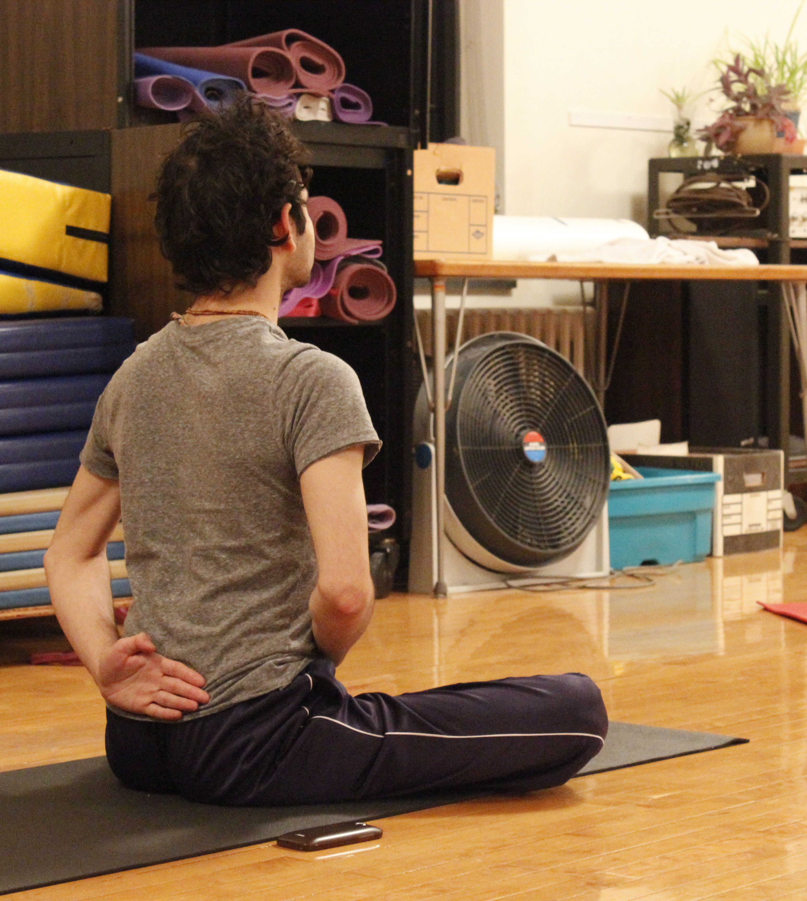 Image of student practicing Yoga in studio. 